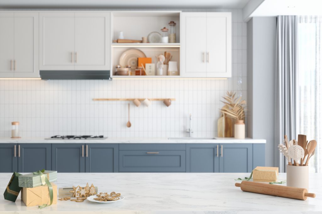 Modern Kitchen With Homemade Gingerbread Cookies And Gift Boxes On Kitchen Counter.  Baking And Selling Cookies